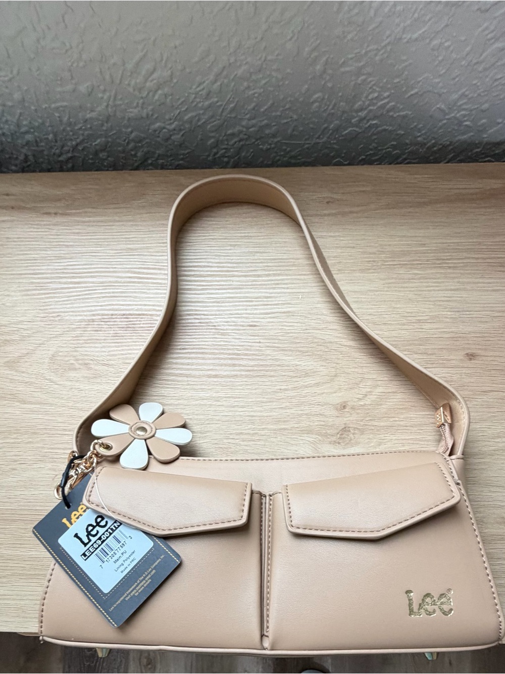 Lee Beige Shoulder Bag with Floral Charm Accent